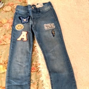 Distressed patchwork girls jeans